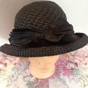 Vintage crocheted cloche hat, with wide velvet ribbon , large and small bow.